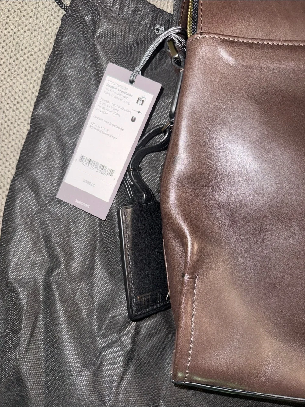 Tumi Dark Brown Leather Messenger Bag with Black Strap